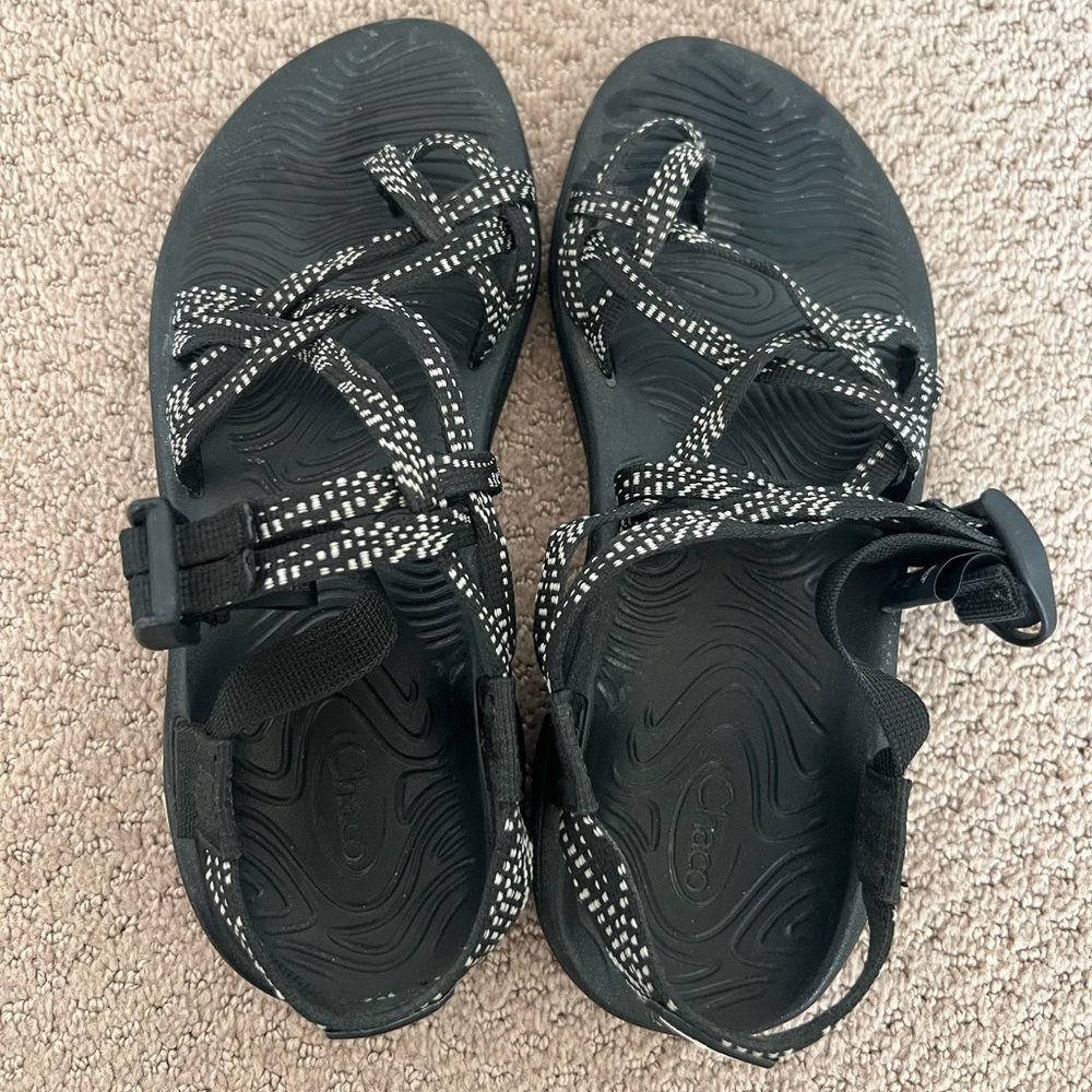 Chaco’s black and white sandals with toe strap